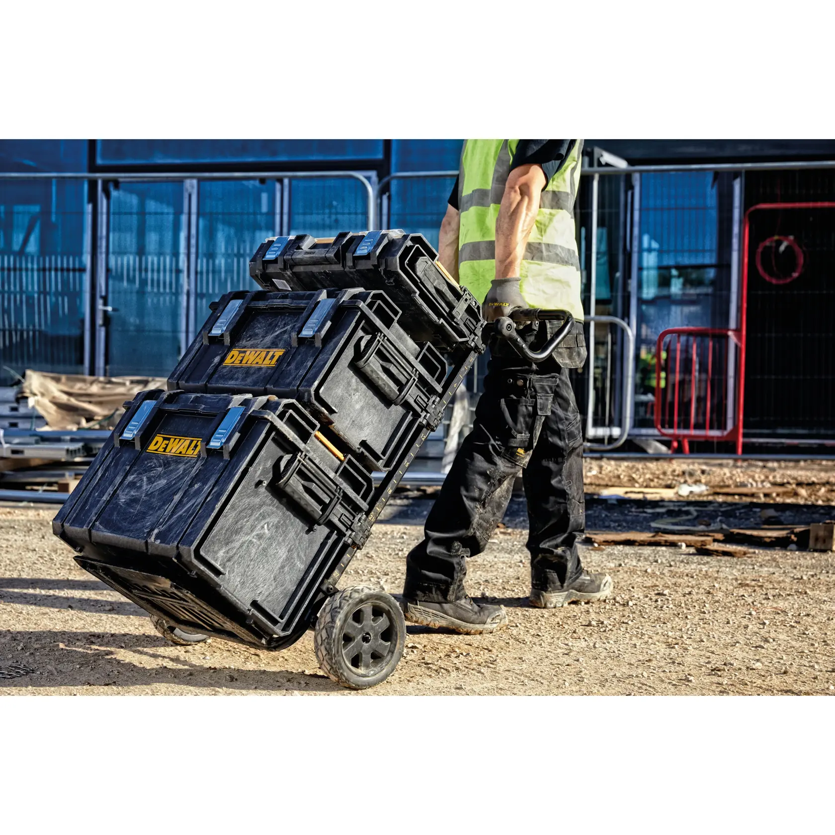DEWALT ToughSystem 2.0 Werbegrafik mit dem Slogan 'Storage Built to Handle It' in großen, gelben Buchstaben auf einem dunklen, strukturierten Hintergrund.
