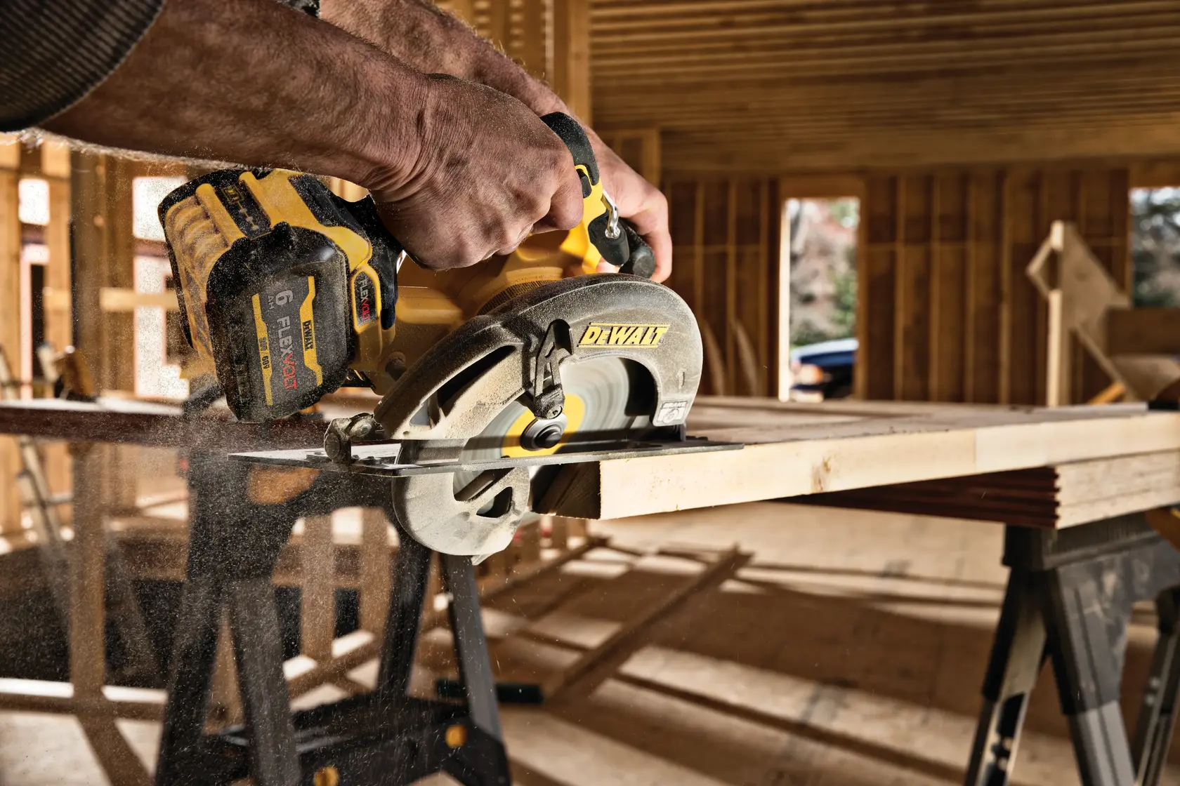 DEWALT circular saw cutting wood, SKUs DCS578T2, DCS578T2-GB, in construction site, close-up action.