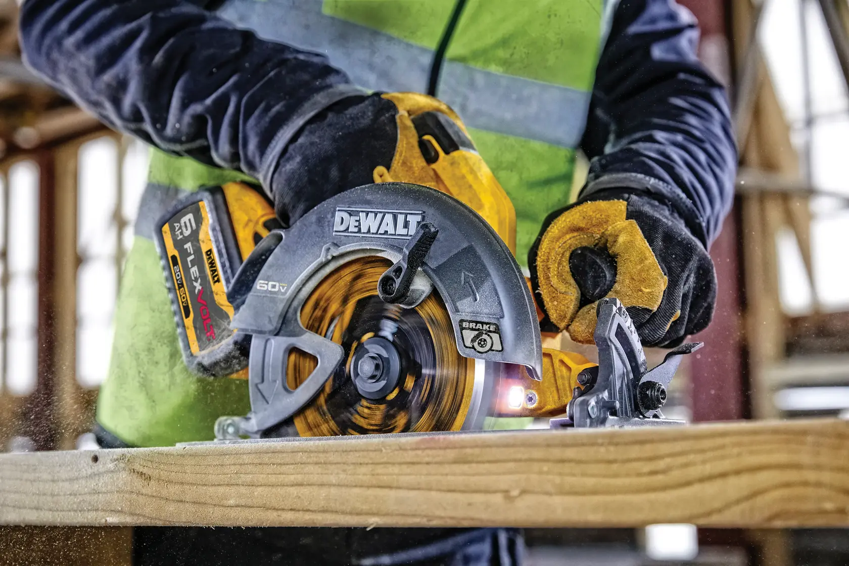 Photo of DEWALT circular saw cutting wood, SKUs DCS578T2, DCS578T2-GB, construction setting.