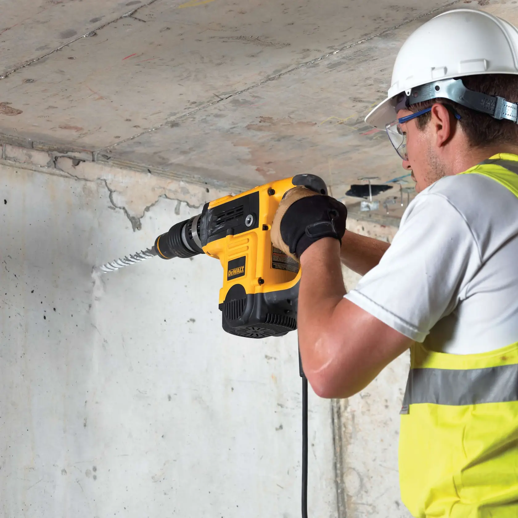 Graphic showing DEWALT XTREME Sub-Compact Series branding with the slogan 'Compact and Performance Packed' on a yellow background.