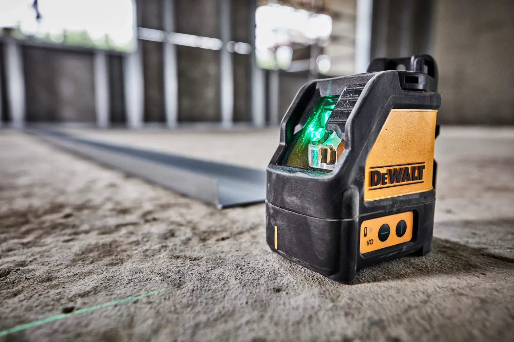 DEWALT DW088CG green laser level in black and yellow housing with controls and branded logo on the side.