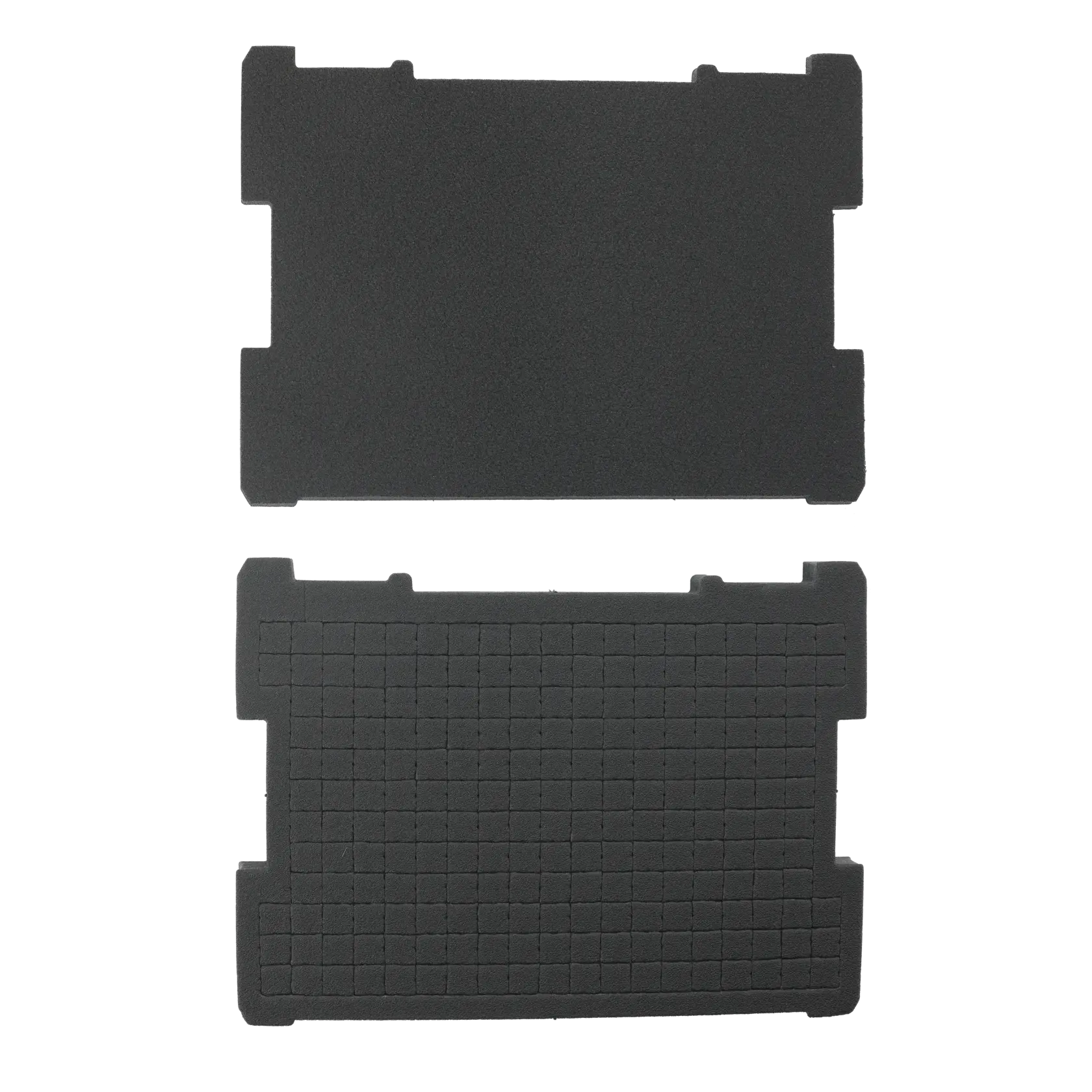 Two rectangular black foam inserts, one plain and one grid-patterned, used for tool storage or protection.