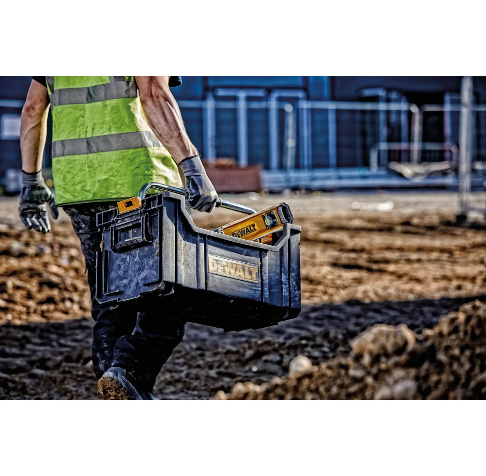 DEWALT ToughSystem 2.0 promotional graphic with the slogan 'Storage Built to Handle It' in large, bold yellow lettering on a dark, textured background.